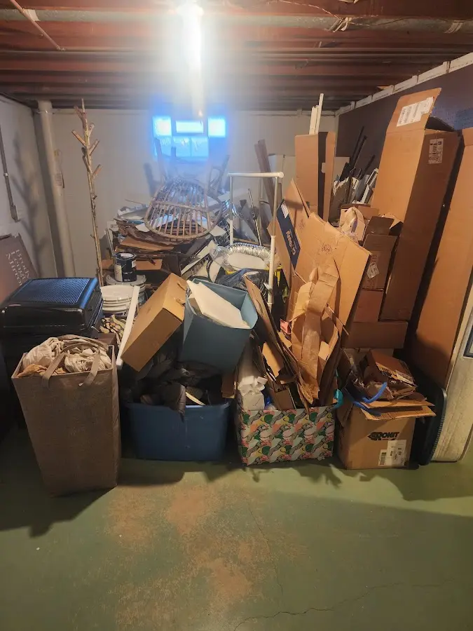 Roll-off dumpster container at job site for Cleanout Dumpster Rental in East Hampton